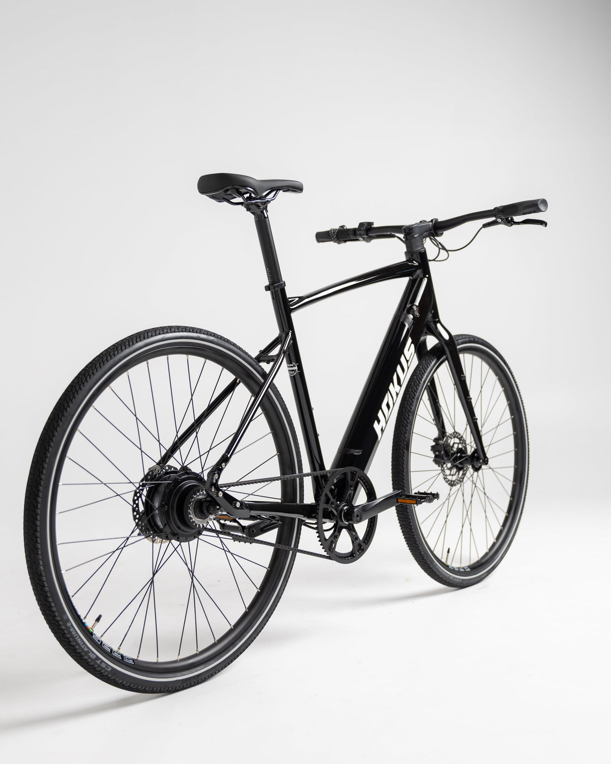 Sleek Black Surge Electric Commuter Bike: 90km Range, Carbon Drive, Lightweight Urban Ride
