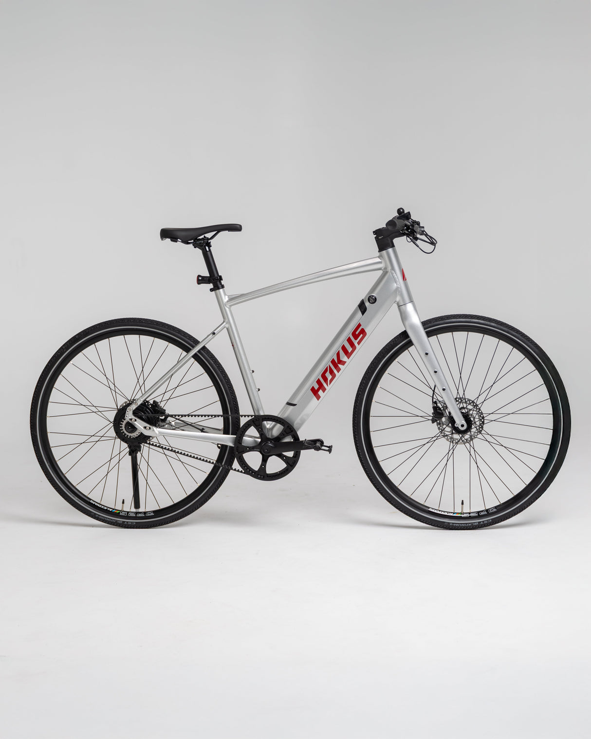 Hokus Surge Silver Electric Commuter Bike: Lightweight, Long Range, Carbon Drive, Hydraulic Brakes