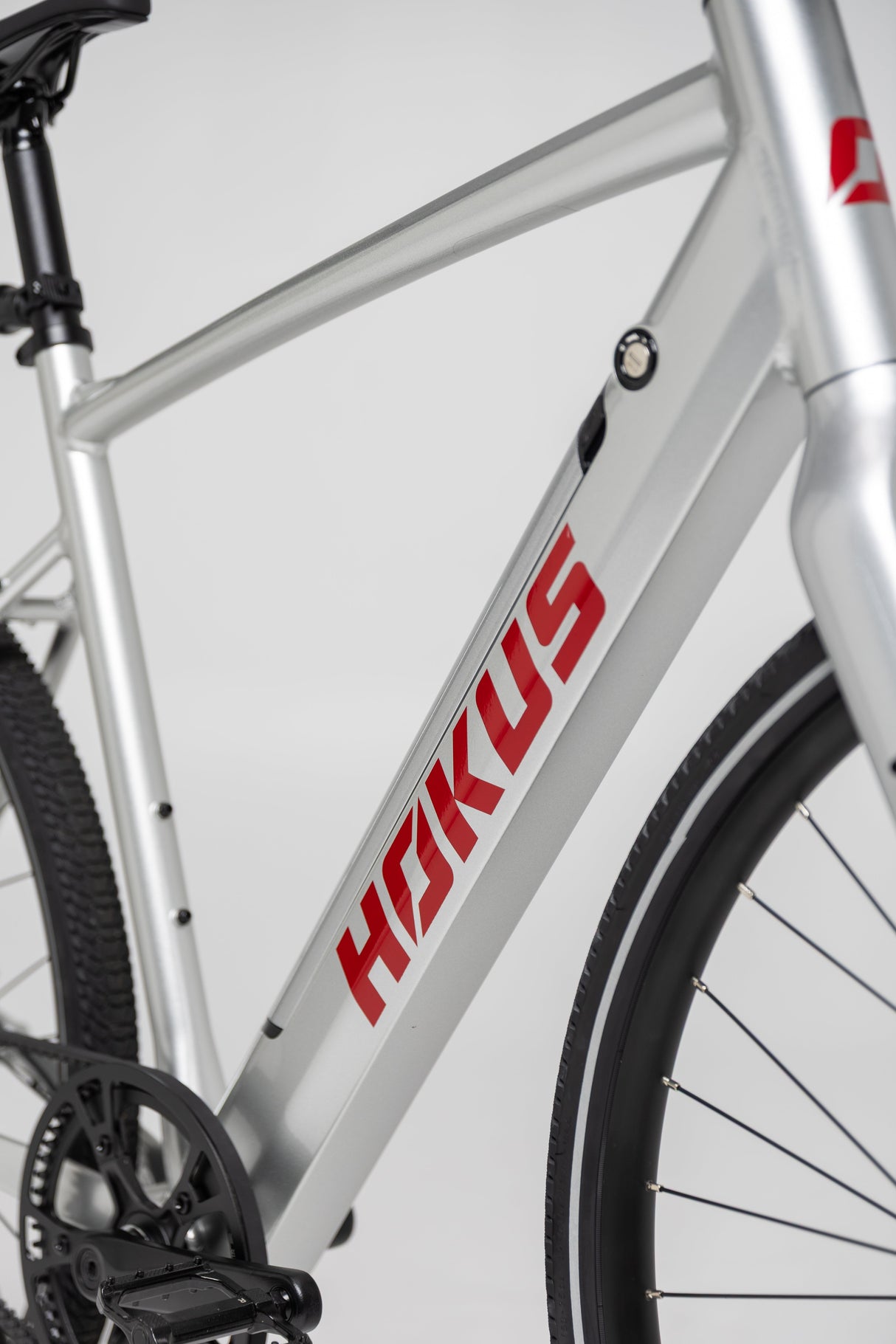 Hokus Surge Silver Electric Commuter Bike: Lightweight, Long Range, Carbon Drive, Hydraulic Brakes