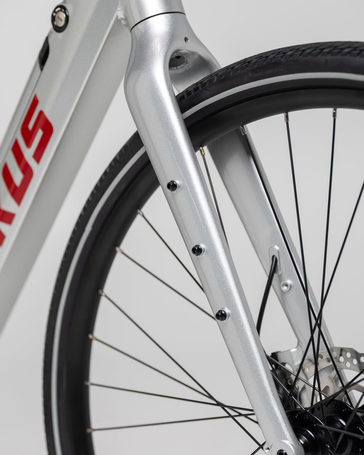 Hokus Surge Silver Electric Commuter Bike: Lightweight, Long Range, Carbon Drive, Hydraulic Brakes